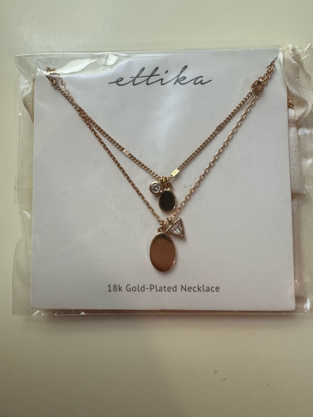 ettika Gold Layered Charm Necklace with Oval and Triangle Pendants